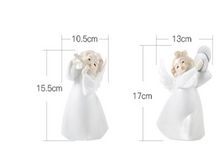 Delicate mini figurines of angels, ideal for adding a heavenly touch to your living room decor.