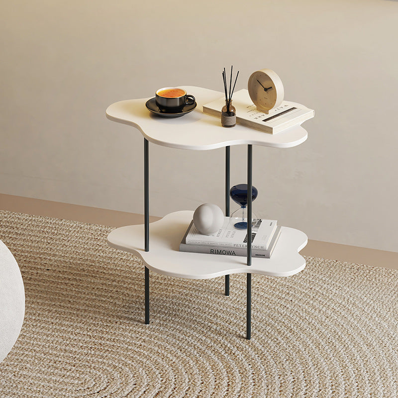 A contemporary coffee table featuring a polygonal-shaped cloud design, embodying modern minimalism and functionality as a stylish shelf.