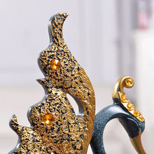 Couple Swan Figurine Home Decoration: A graceful figurine featuring a pair of swans, symbolizing love and devotion, ideal for enhancing the ambiance of any home decor.