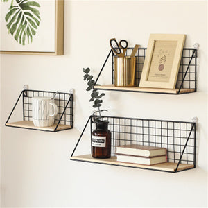A traditional Japanese-style wrought iron wall hanging basket, ideal for displaying plants or storing items with a touch of elegant simplicity.