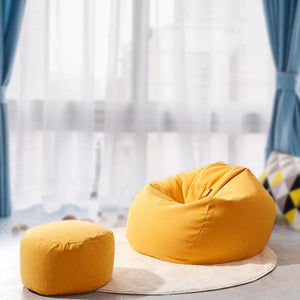A comfortable and versatile bean bag cover for a lazy sofa, providing a cozy seating option with a relaxed and casual vibe.