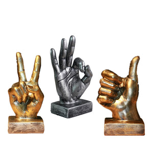 A stylish resin figurine featuring a hand gesture design, adding a modern and artistic flair to your home decor.