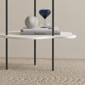 A contemporary coffee table featuring a polygonal-shaped cloud design, embodying modern minimalism and functionality as a stylish shelf.