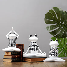Charming figurines depicting frogs in various yoga poses, adding a whimsical and zen-inspired touch to your home decor.