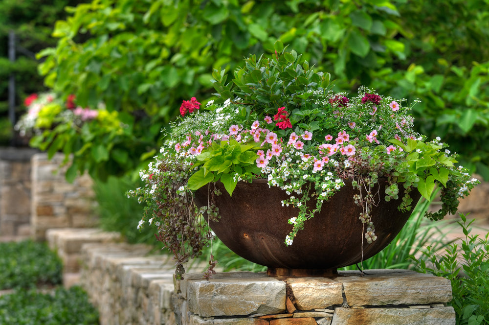 Using Planters To Brighten Up Your Garden