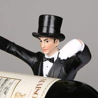 A whimsical wine holder featuring a magician figurine, adding a touch of enchantment and charm to your wine display.