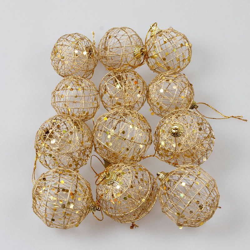 A festive Christmas ball ornament with a scaly texture and golden dusting, adding a touch of glamour and sparkle to holiday decorations.