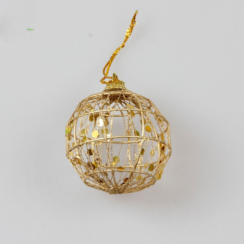 A festive Christmas ball ornament with a scaly texture and golden dusting, adding a touch of glamour and sparkle to holiday decorations.