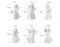 Delicate mini figurines of angels, ideal for adding a heavenly touch to your living room decor.