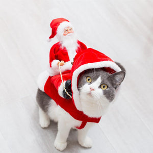 A festive pet costume featuring a green elf and Santa riding design, perfect for adding holiday cheer to your furry friend's wardrobe.