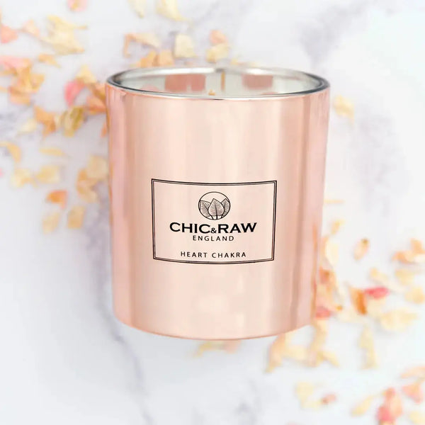 Close-up of rose quartz crystal candle, natural soy wax, heart chakra