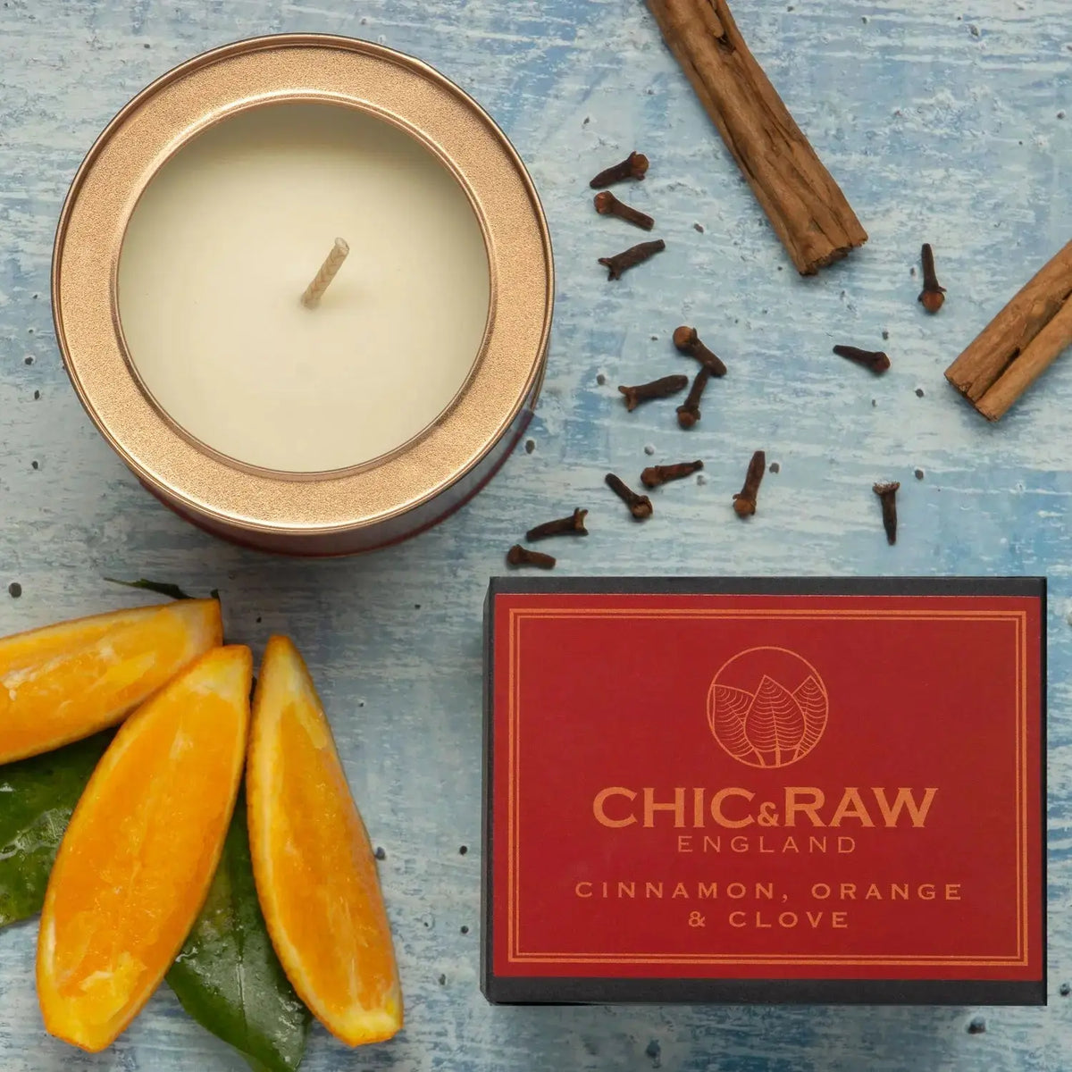 Cinnamon, orange, and clove candle, warm spicy scent, aromatherapy