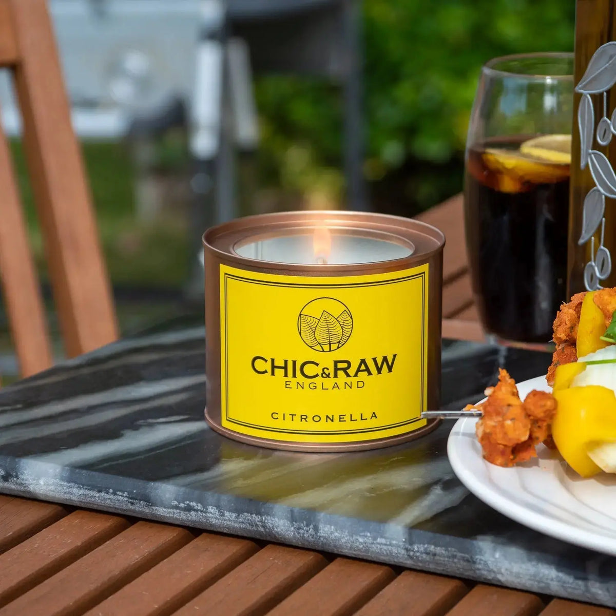 Lit citronella candle, long-lasting, eco-friendly candle
