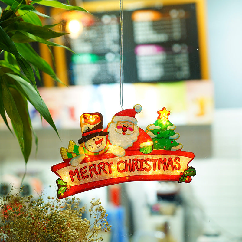 Cheerful LED decorations featuring Santa Claus, a snowman, and an elk, perfect for adding festive charm to your windows during the holiday season.