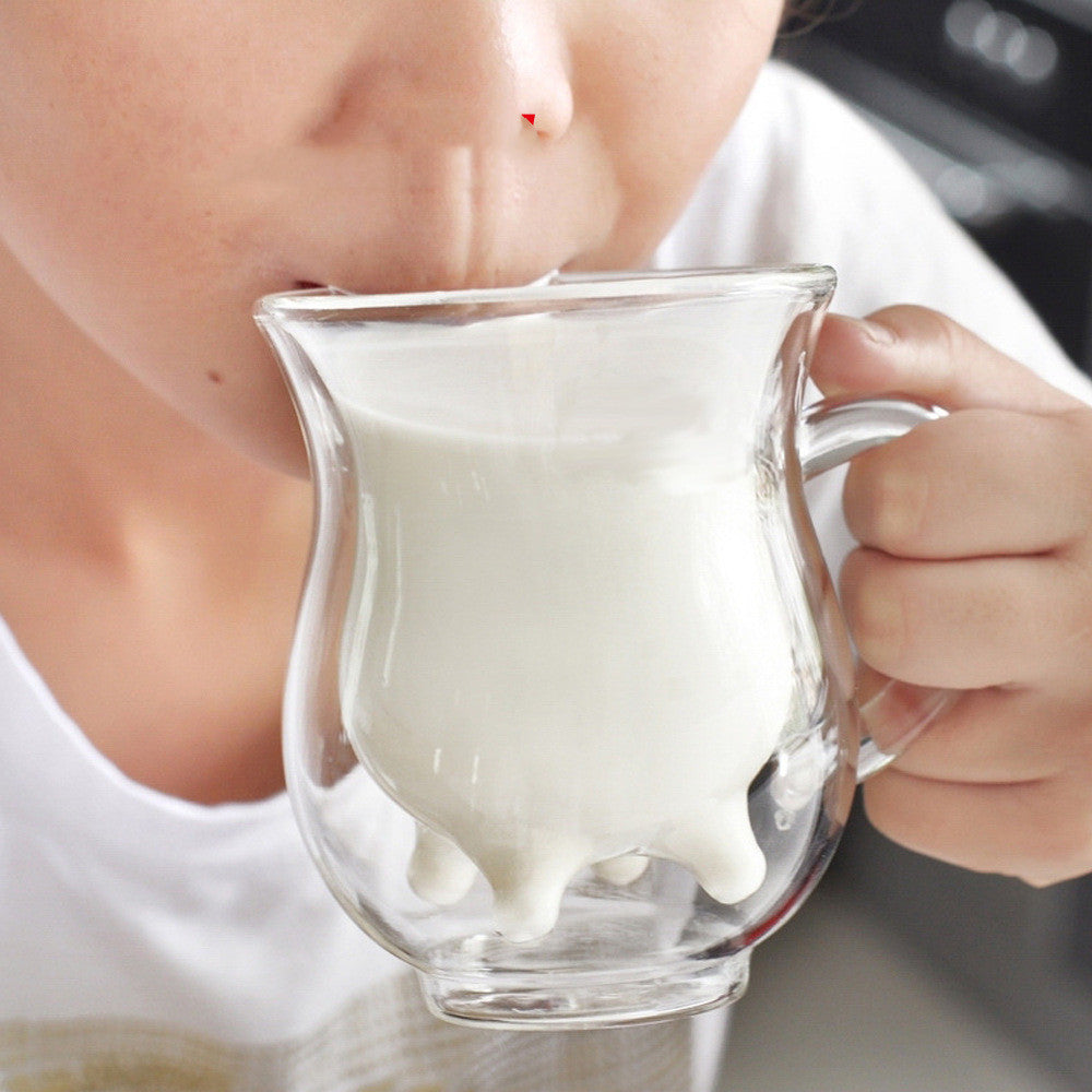  A charming double glass cup designed with a milk theme, perfect for serving beverages with a touch of cuteness and whimsy.