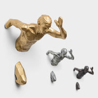 Running Character Wall Hanging Figurine: A dynamic wall hanging figurine depicting a running character in motion, adding energy and personality to your decor.