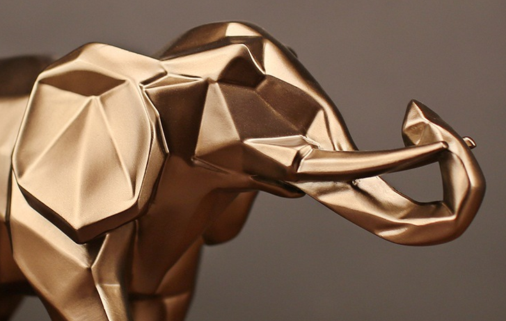 A stylish geometric elephant sculpture, serving as a contemporary and artistic home decoration crafted with precision and elegance.