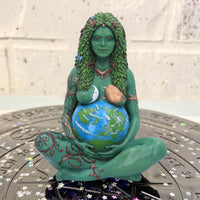 An artistic figurine representing Mother Earth, perfect for enhancing the ambiance of both home interiors and garden spaces with its symbolic and naturalistic design.