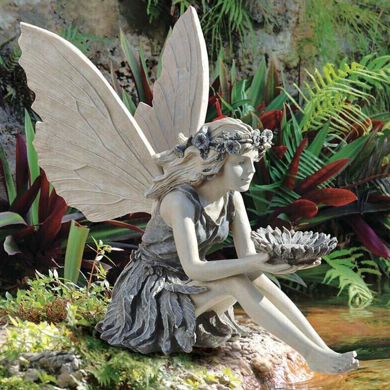 weatherproof fairy statues for outdoors.