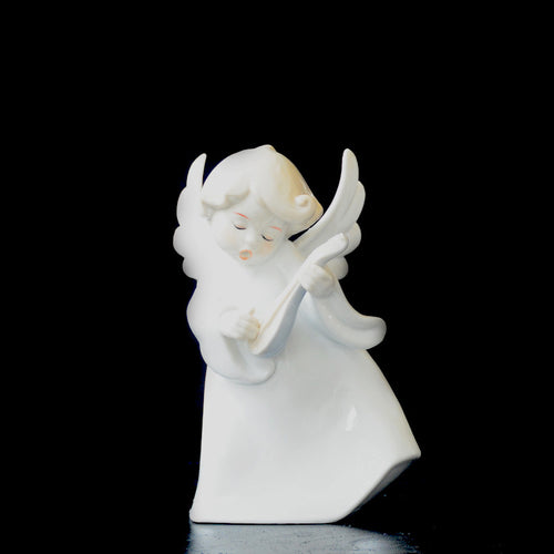 Delicate mini figurines of angels, ideal for adding a heavenly touch to your living room decor.