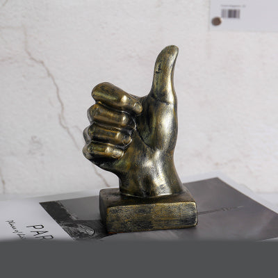 A stylish resin figurine featuring a hand gesture design, adding a modern and artistic flair to your home decor.