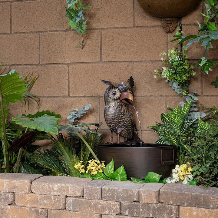 A charming rustic fountain crafted from resin, featuring flowing water and private molds, adding a peaceful and artistic touch to your garden decor.