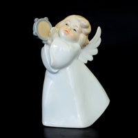 Delicate mini figurines of angels, ideal for adding a heavenly touch to your living room decor.