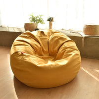 A comfortable and versatile bean bag cover for a lazy sofa, providing a cozy seating option with a relaxed and casual vibe.