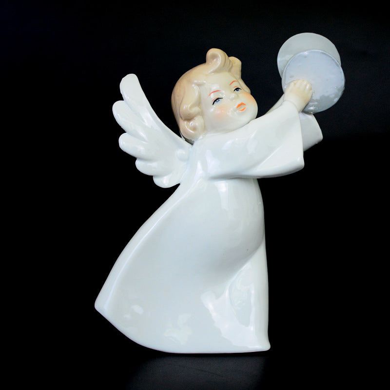 Delicate mini figurines of angels, ideal for adding a heavenly touch to your living room decor.