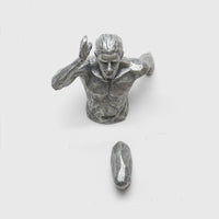 Running Character Wall Hanging Figurine: A dynamic wall hanging figurine depicting a running character in motion, adding energy and personality to your decor.