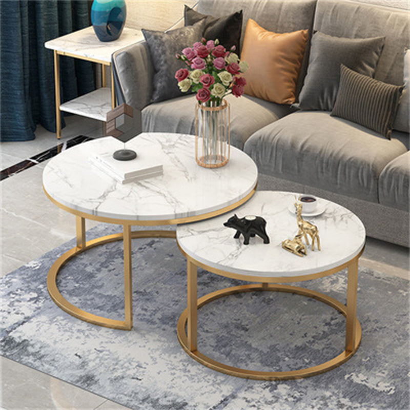 A set of nesting coffee tables, perfect for versatile use and space-saving functionality in any living room setting.