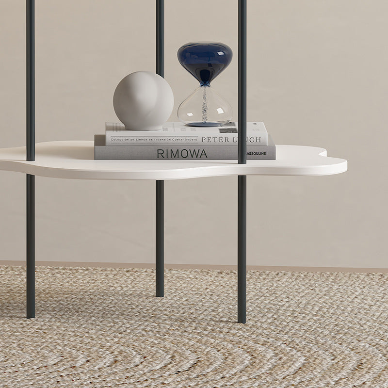 A contemporary coffee table featuring a polygonal-shaped cloud design, embodying modern minimalism and functionality as a stylish shelf.