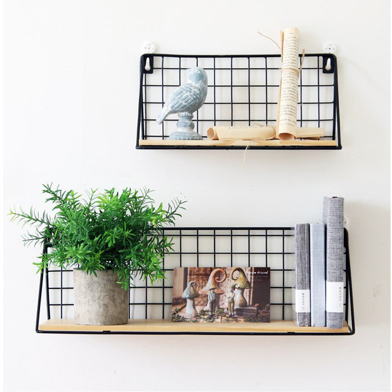 A traditional Japanese-style wrought iron wall hanging basket, ideal for displaying plants or storing items with a touch of elegant simplicity.