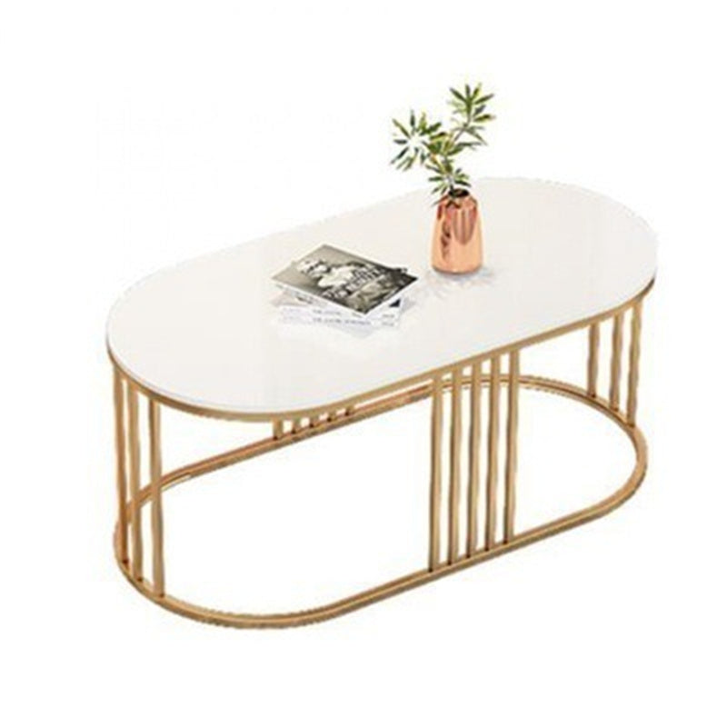 A set of nesting coffee tables, perfect for versatile use and space-saving functionality in any living room setting.